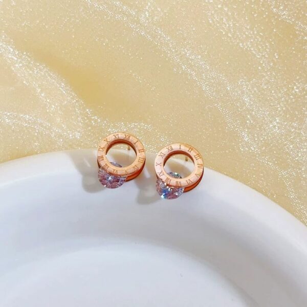 Boucles d’oreilles ajourées romaines couleur or rose